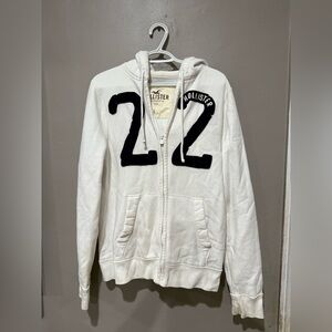 Hollister Cream Zip-Up Hoodie with Black Design